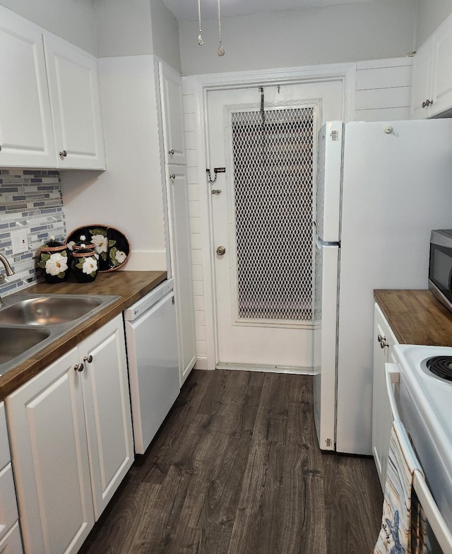 131 Doolen Ct Unit 302, North Palm Beach, FL 33408 - kitchen with white appliances, butcher block counters, dark wood-style floors, backsplash, and white cabinetry