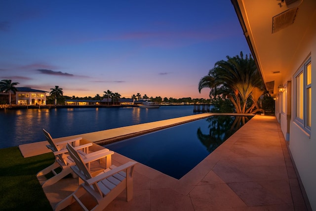 1921 W Terra Mar Dr, Lauderdale By The Sea, FL 33062 - view of pool with a water view