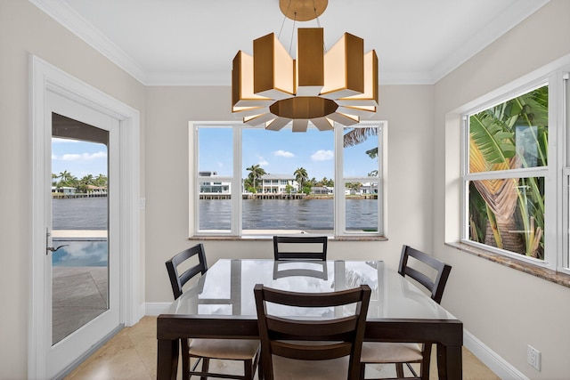 1921 W Terra Mar Dr, Lauderdale By The Sea, FL 33062 - dining room featuring a water view, plenty of natural light, and ornamental molding