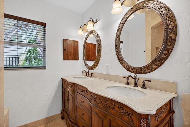 1921 W Terra Mar Dr, Lauderdale By The Sea, FL 33062 - bathroom with double vanity and baseboards