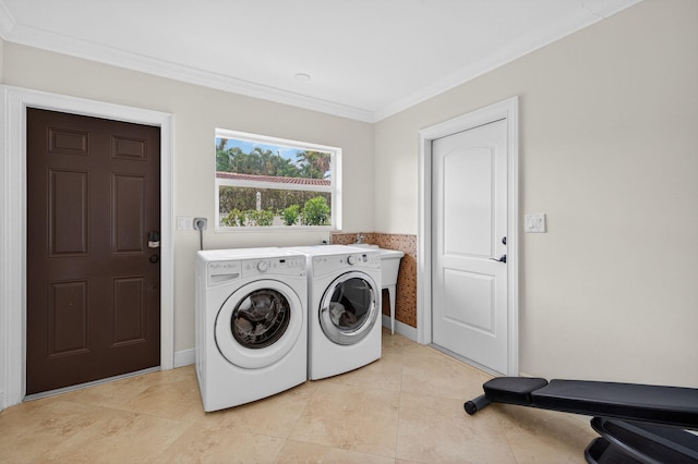 1921 W Terra Mar Dr, Lauderdale By The Sea, FL 33062 - laundry area with washer and clothes dryer, crown molding, and light tile patterned floors