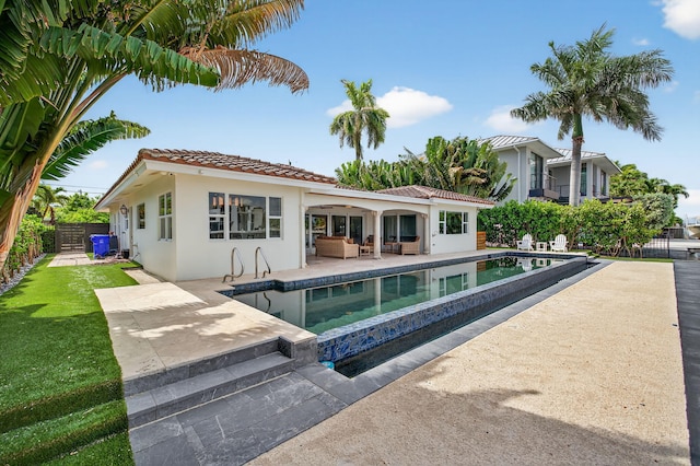 1921 W Terra Mar Dr, Lauderdale By The Sea, FL 33062 - back of house featuring a patio area, a tiled roof, stucco siding, and an outdoor hangout area