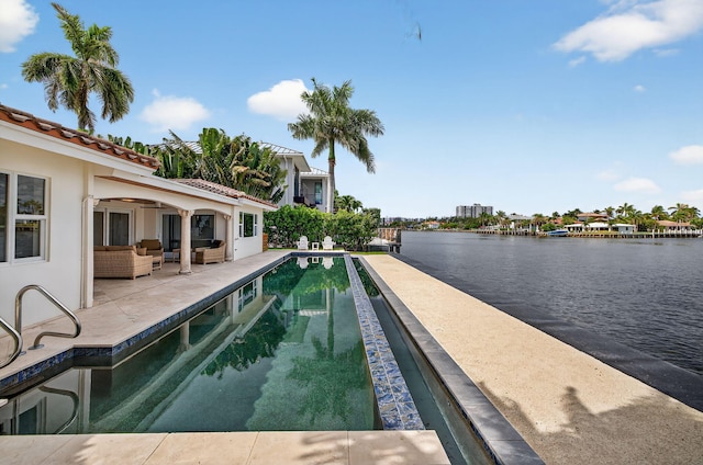 1921 W Terra Mar Dr, Lauderdale By The Sea, FL 33062 - view of swimming pool featuring outdoor lounge area, a patio area, a water view, and a ceiling fan