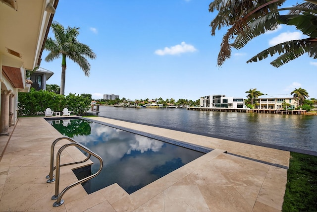 1921 W Terra Mar Dr, Lauderdale By The Sea, FL 33062 - swimming pool featuring a water view and a patio