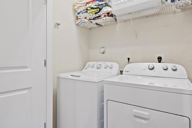 2366 Byron St, Palm Springs, FL 33406 - laundry area featuring washing machine and clothes dryer