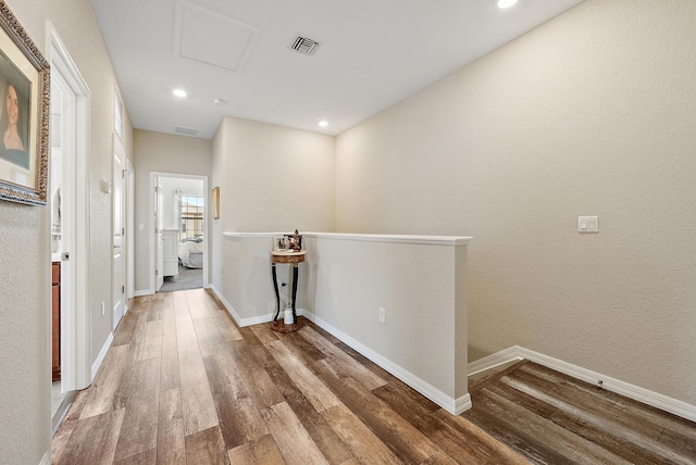 2366 Byron St, Palm Springs, FL 33406 - corridor featuring wood finished floors, attic access, and recessed lighting