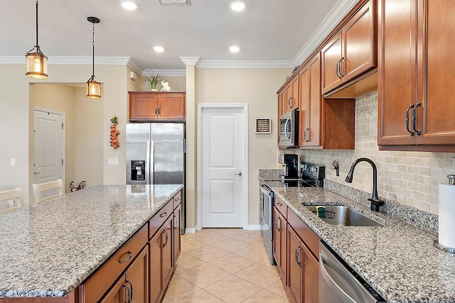 2366 Byron St, Palm Springs, FL 33406 - kitchen with stainless steel appliances, brown cabinets, light stone countertops, crown molding, and backsplash