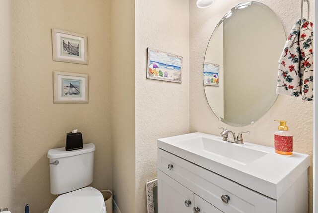 2366 Byron St, Palm Springs, FL 33406 - half bath with vanity and a textured wall