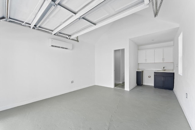 1420 Lake Ave, Lake Worth Beach, FL 33460 - garage with an AC wall unit and baseboards