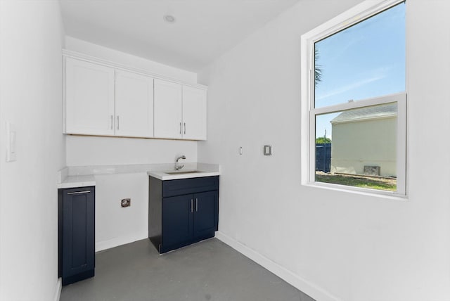 1420 Lake Ave, Lake Worth Beach, FL 33460 - laundry area featuring baseboards
