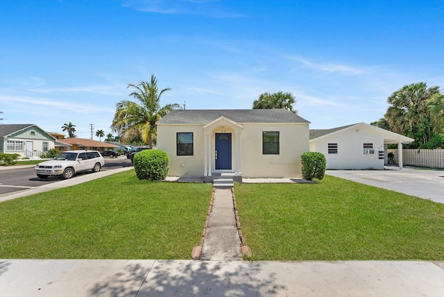 1420 Lake Ave, Lake Worth Beach, FL 33460 - bungalow-style house with stucco siding