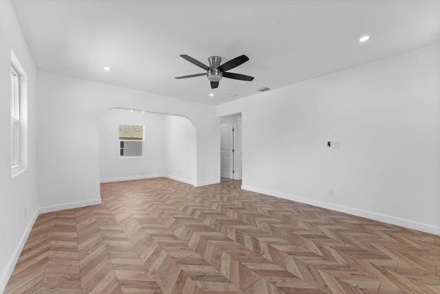 1420 Lake Ave, Lake Worth Beach, FL 33460 - spare room featuring arched walkways, a ceiling fan, and recessed lighting