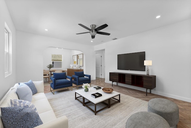 1420 Lake Ave, Lake Worth Beach, FL 33460 - living room featuring arched walkways, a ceiling fan, and recessed lighting