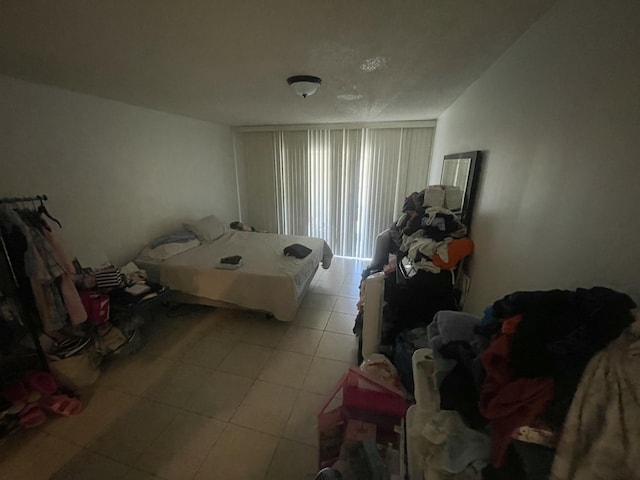 4116 NW 88th Ave Unit 206, Coral Springs, FL 33065 - bedroom with light tile patterned flooring