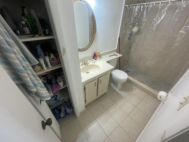 4116 NW 88th Ave Unit 206, Coral Springs, FL 33065 - bathroom with tile patterned floors, a stall shower, and vanity
