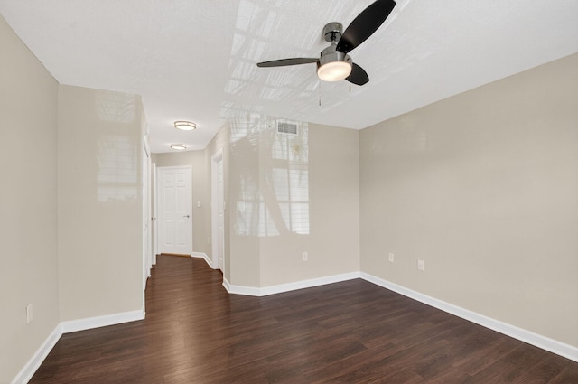 15035 Michelangelo Blvd Unit 105, Delray Beach, FL 33446 - empty room featuring ceiling fan and dark wood-type flooring