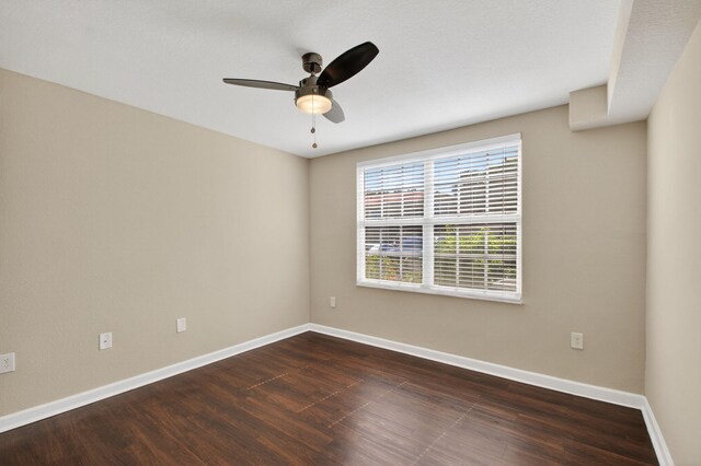15035 Michelangelo Blvd Unit 105, Delray Beach, FL 33446 - spare room featuring ceiling fan and dark wood-style flooring