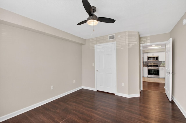15035 Michelangelo Blvd Unit 105, Delray Beach, FL 33446 - unfurnished bedroom with dark wood-style flooring and a ceiling fan