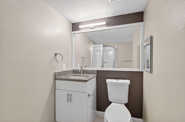 15035 Michelangelo Blvd Unit 105, Delray Beach, FL 33446 - full bath with vanity, a shower stall, a textured wall, and a textured ceiling