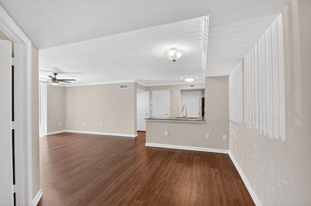15035 Michelangelo Blvd Unit 105, Delray Beach, FL 33446 - spare room with ceiling fan, dark wood-style floors, and crown molding