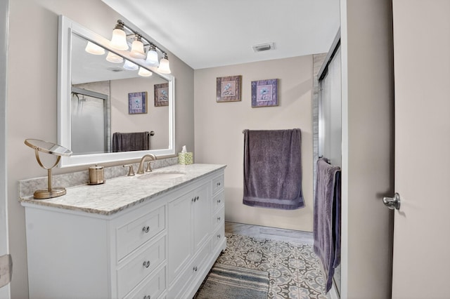 14425 Strathmore Ln Unit 404, Delray Beach, FL 33446 - bathroom with vanity and an enclosed shower