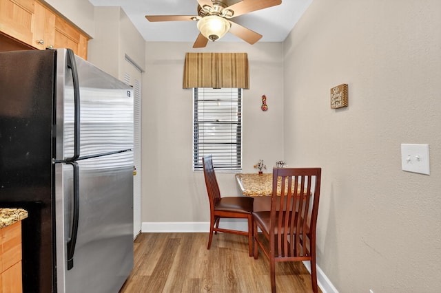 14425 Strathmore Ln Unit 404, Delray Beach, FL 33446 - dining room featuring light wood finished floors and a ceiling fan