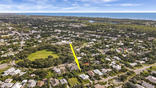 9155 SE Athena St, Hobe Sound, FL 33455 - aerial overview of property's location featuring nearby suburban area and a large body of water