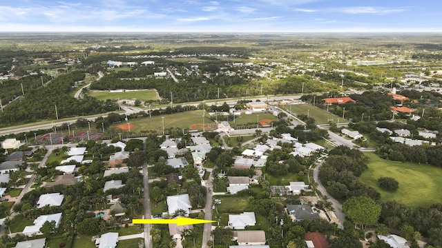 9155 SE Athena St, Hobe Sound, FL 33455 - aerial overview of property's location featuring nearby suburban area