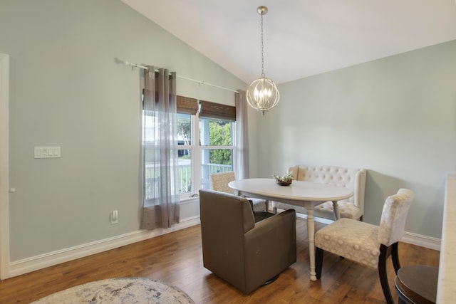 9155 SE Athena St, Hobe Sound, FL 33455 - dining area featuring a chandelier, wood finished floors, and lofted ceiling