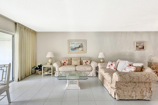 1600 SE Saint Lucie Blvd SE Unit 211, Stuart, FL 34996 - living room featuring light tile patterned floors