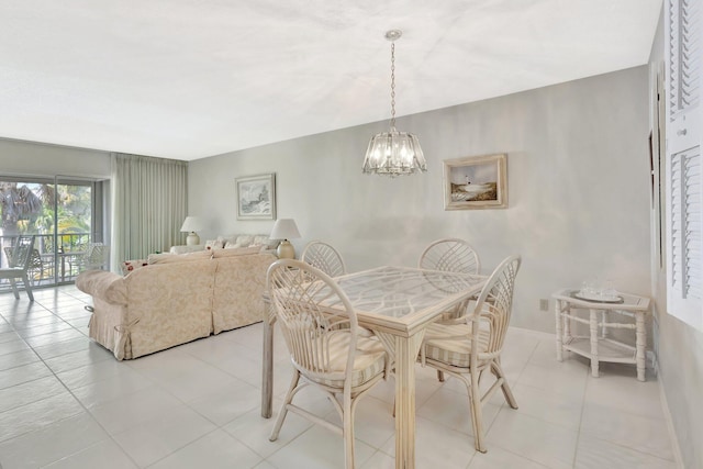 1600 SE Saint Lucie Blvd SE Unit 211, Stuart, FL 34996 - dining area featuring a chandelier and light tile patterned floors