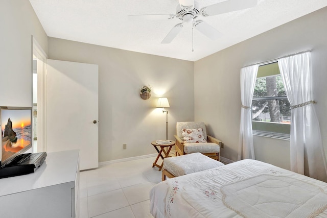 1600 SE Saint Lucie Blvd SE Unit 211, Stuart, FL 34996 - bedroom featuring light tile patterned floors and ceiling fan