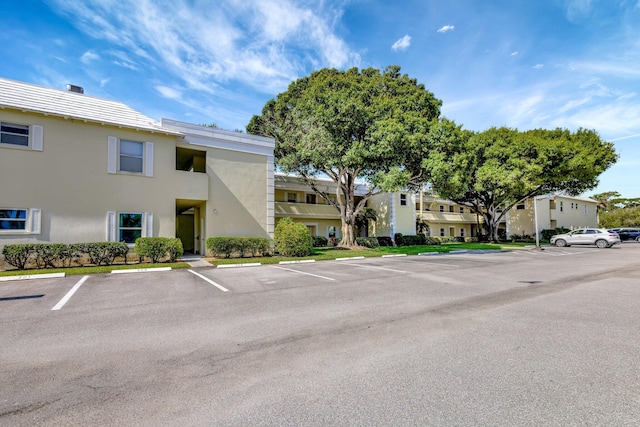 1600 SE Saint Lucie Blvd SE Unit 211, Stuart, FL 34996 - view of property featuring uncovered parking