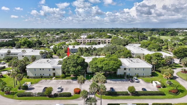 1600 SE Saint Lucie Blvd SE Unit 211, Stuart, FL 34996 - aerial view of residential area featuring a tree filled landscape