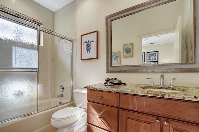 13308 Verdun Dr, Palm Beach Gardens, FL 33410 - bathroom featuring vanity and bath / shower combo with glass door