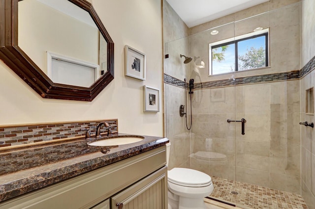 13308 Verdun Dr, Palm Beach Gardens, FL 33410 - full bathroom featuring a stall shower, vanity, and backsplash