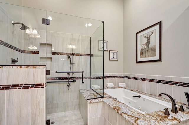 13308 Verdun Dr, Palm Beach Gardens, FL 33410 - full bathroom with a stall shower and a whirlpool tub