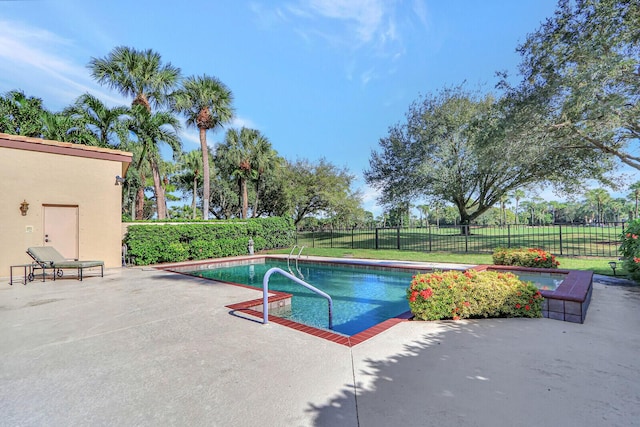 13308 Verdun Dr, Palm Beach Gardens, FL 33410 - view of swimming pool with a patio