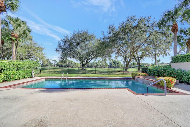 13308 Verdun Dr, Palm Beach Gardens, FL 33410 - view of pool featuring a patio area and a fenced backyard