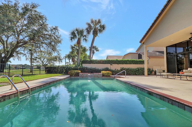 13308 Verdun Dr, Palm Beach Gardens, FL 33410 - view of pool with a fenced backyard and a patio area