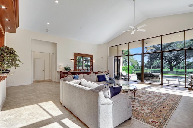 13308 Verdun Dr, Palm Beach Gardens, FL 33410 - living area featuring ceiling fan, high vaulted ceiling, and light tile patterned floors