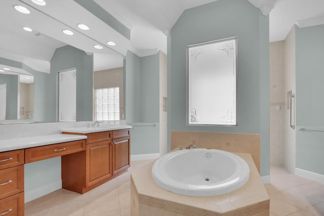 8732 Bally Bunion Rd, Port Saint Lucie, FL 34986 - full bath featuring a garden tub, vanity, lofted ceiling, tile patterned floors, and recessed lighting