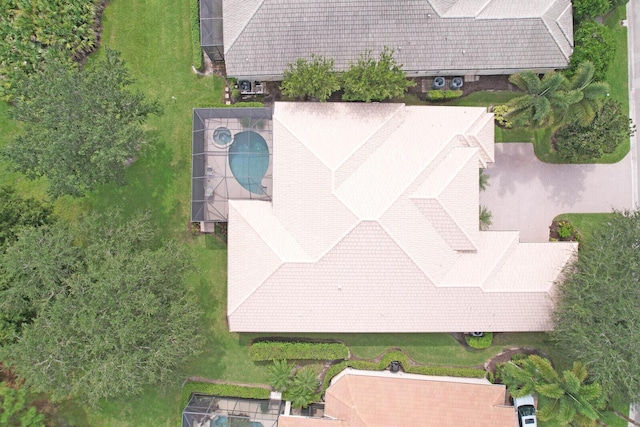 8732 Bally Bunion Rd, Port Saint Lucie, FL 34986 - view from above of property featuring a pool area