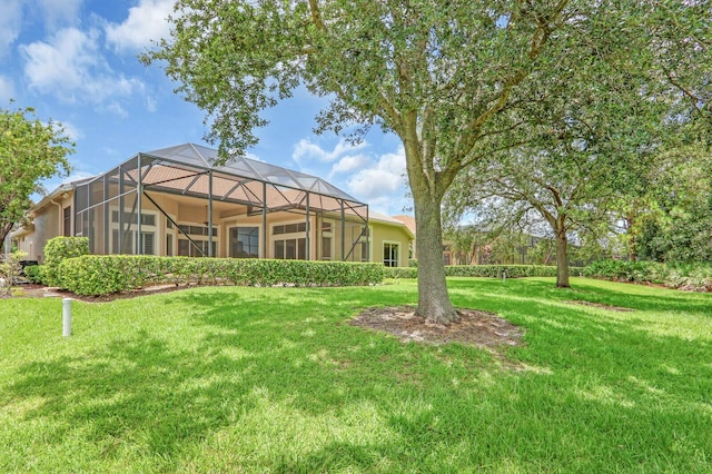 8732 Bally Bunion Rd, Port Saint Lucie, FL 34986 - view of grassy yard with glass enclosure
