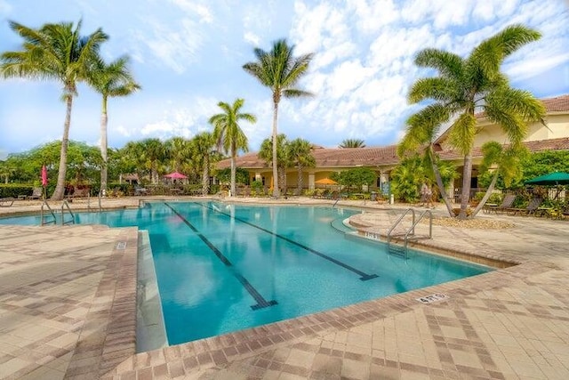 8732 Bally Bunion Rd, Port Saint Lucie, FL 34986 - community pool with a patio