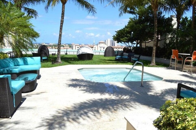 550 Okeechobee Blvd Unit 114, West Palm Beach, FL 33401 - view of swimming pool with a patio area, a swimming pool, and outdoor lounge area