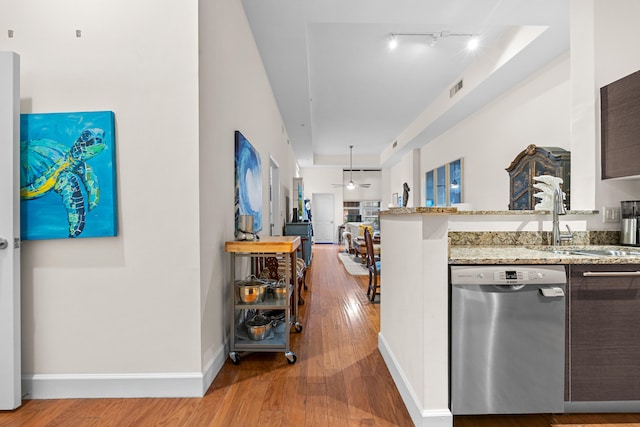 550 Okeechobee Blvd Unit 114, West Palm Beach, FL 33401 - hall with light wood finished floors and track lighting