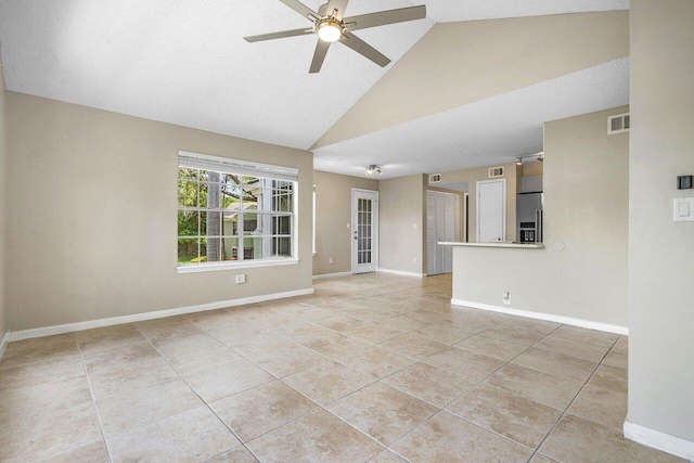 1000 Crystal Way Unit J, Delray Beach, FL 33444 - spare room with ceiling fan, light tile patterned floors, and high vaulted ceiling