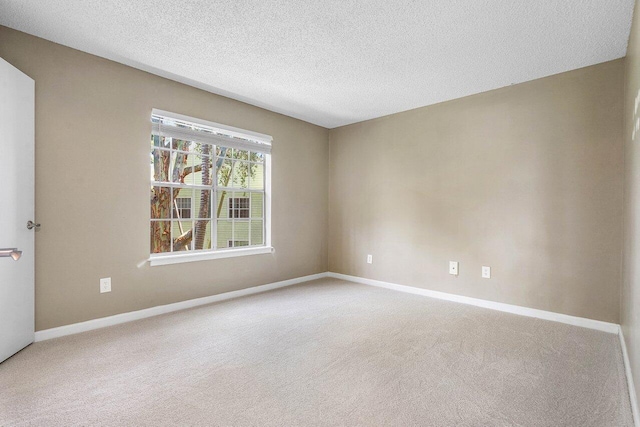 1000 Crystal Way Unit J, Delray Beach, FL 33444 - empty room featuring carpet floors and a textured ceiling