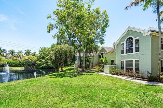 1000 Crystal Way Unit J, Delray Beach, FL 33444 - view of green lawn with a water view